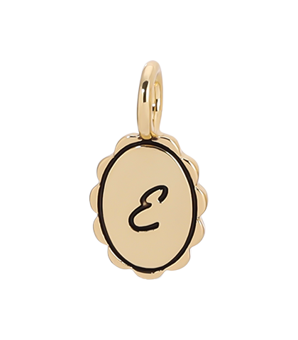 A gold charm in an oval shape with a scalloped edge and the letter 'E' in black.