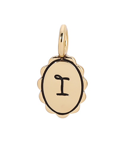 Gold charm pendant with the letter 'I' in black ink.