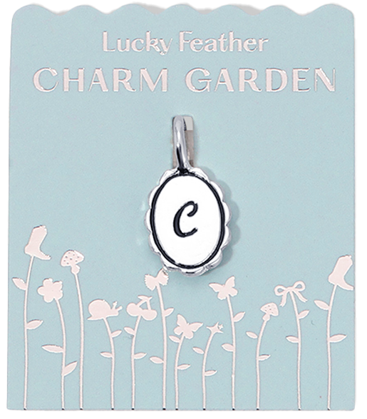 A 'Lucky Feather Charm Garden' pendant with the letter 'C' on a light blue card with a floral design.