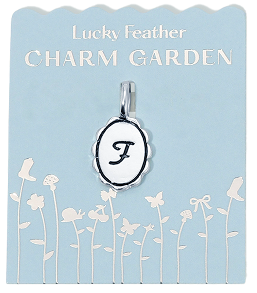 A 'Lucky Feather Charm Garden' tag displays a charm with the letter 'F' against a pale blue background decorated with silhouettes of garden elements.