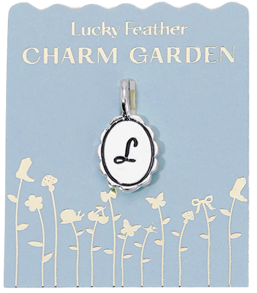 Lucky Feather Charm Garden packaging with an L initial charm.