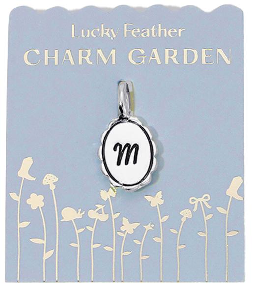 Lucky Feather Charm Garden card with a charm of the letter M.