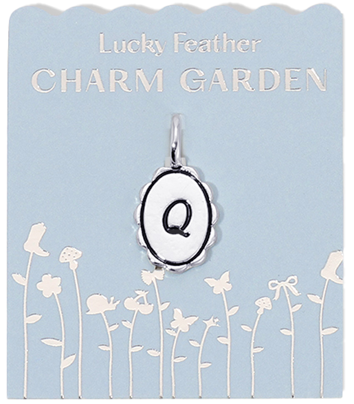 A 'Lucky Feather Charm Garden' card displays a 'Q' charm above a floral pattern.