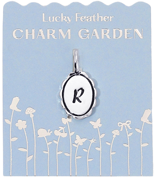 A charm with the letter 'R' is displayed on a light blue card with the words 'Lucky Feather CHARM GARDEN' and garden-themed illustrations.