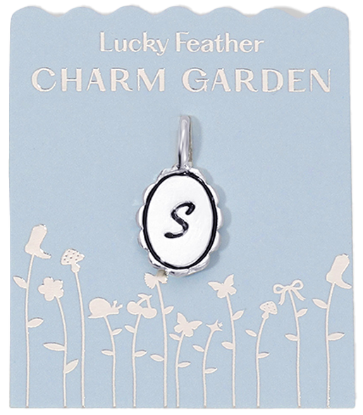 A 'Lucky Feather Charm Garden' charm with the letter 'S' on a blue card with a floral design.