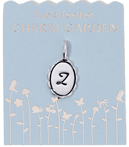 An initial 'Z' charm on a card that reads 'Lucky Feather Charm Garden'.