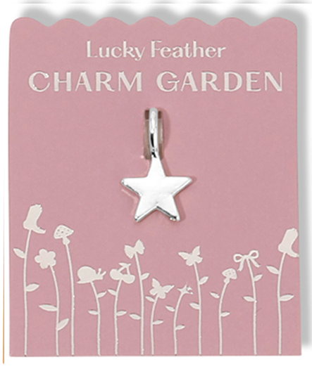 A star charm attached to a pink 'Lucky Feather Charm Garden' card with a floral design.