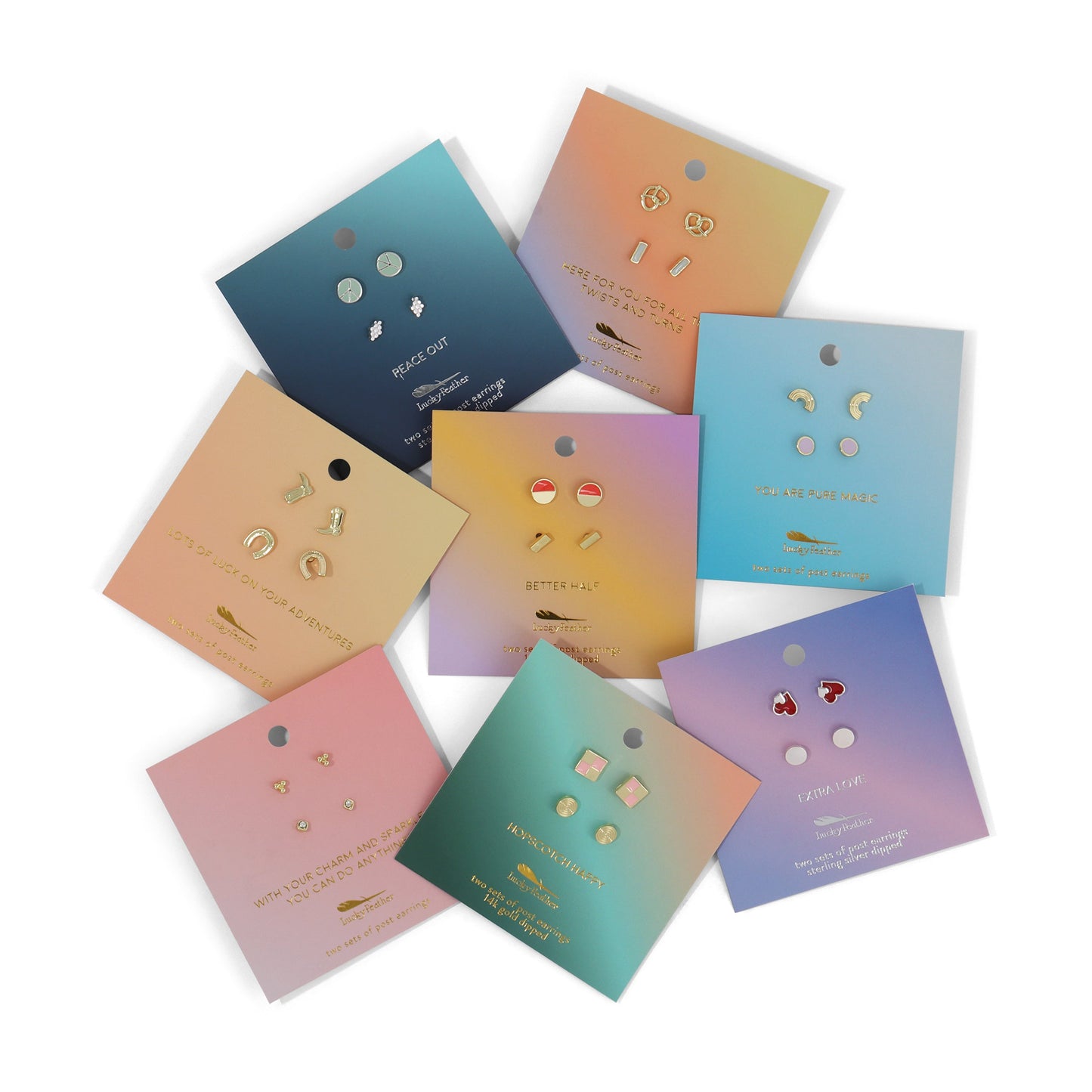 Several sets of Lucky Feather post earrings on gradient-colored cards are arranged in a circle on a white background.
