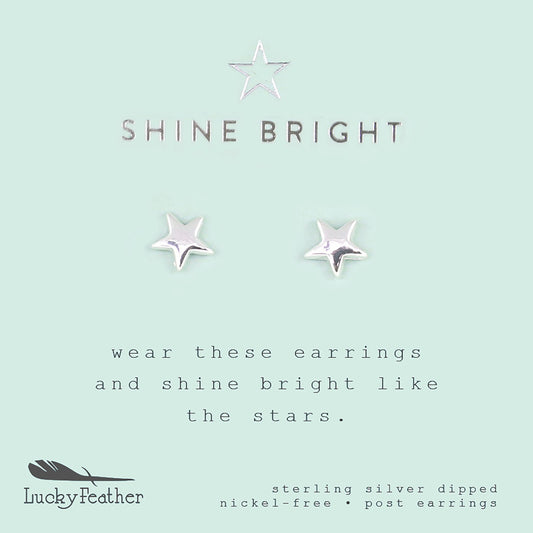 A light blue card displays two star-shaped earrings, the text 'SHINE BRIGHT', and the 'Lucky Feather' logo.